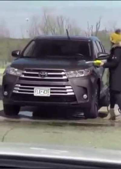 As Seen on 9Gag: She's trying to kill the COVID-19 on her car