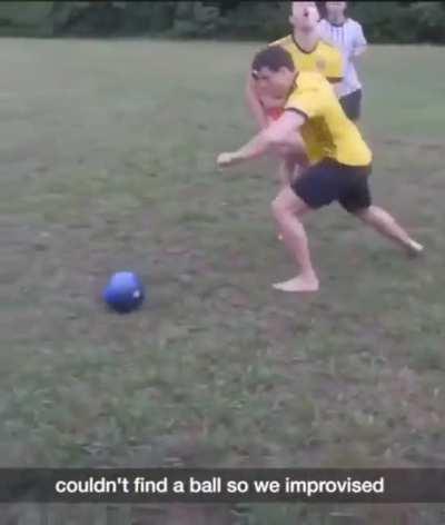 Playing football with a bowling ball