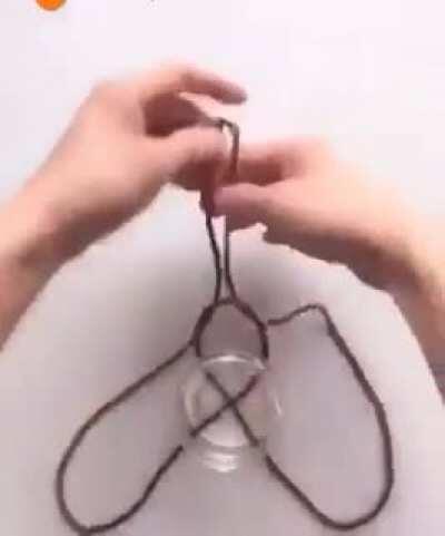 way to hang up a jar or any type of container.