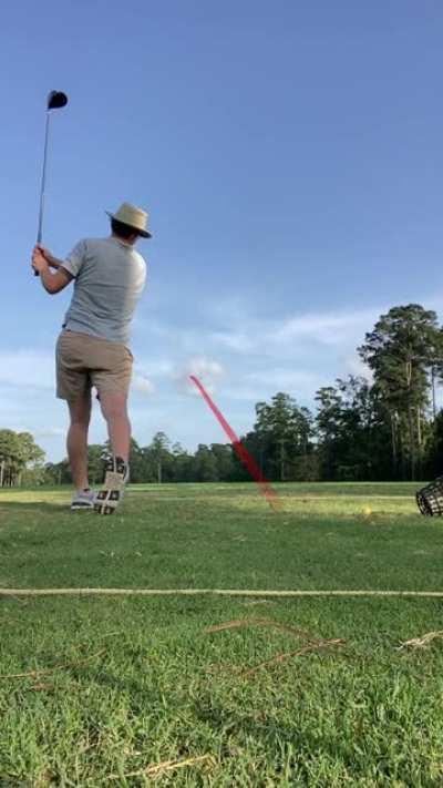Is it possible to hit consistent solid drives with a swing this closed at the top? Also: is it rude to have a random convo on the range like these dudes next to me?