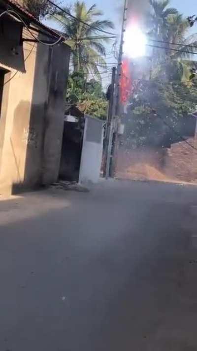 Hanging fireworks on electric wires