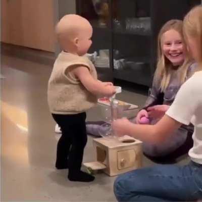 These big sisters were overjoyed to see their baby brother first steps