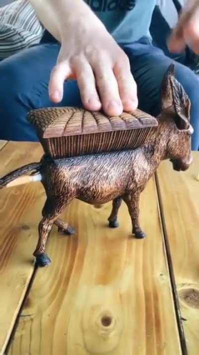 This cigarette dispenser