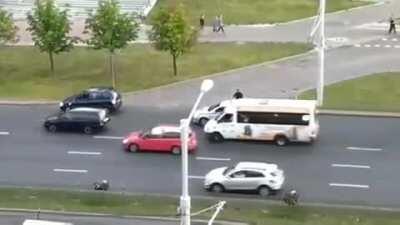 The riot policeman stands and hits the passing cars, broke the glass of the old man, he certainly didn't like it and he went out to find out how and why. The five of them twisted grandfather and took him away.