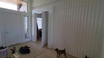 Hidden door and large pivot door.