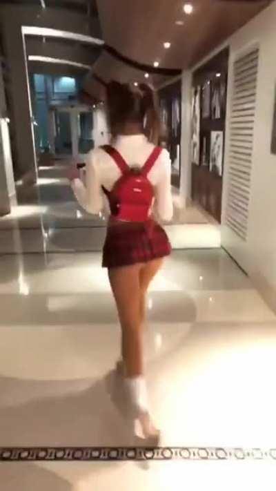 Strutting schoolgirl