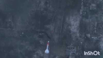 Soldier shoots grenade after it is dropped from a drone. Ukraine, January 2023