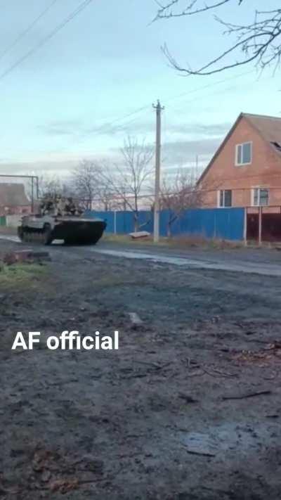 Ukrainian infantry on the move, riding a BMP-1 IFV.