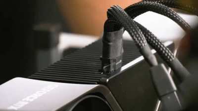 Remind me again why people are buying GPUs with NVIDIA's FireWire 9000++ connector?