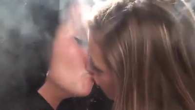 brunette and blonde makeout session in clouds of cigarette smoke!