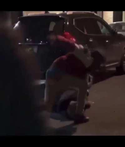 Man gets slammed on the street and repeatedly gets stomped and kicked