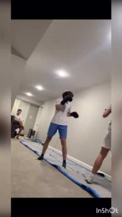 Dumbass kid picks fight with 15 boxer. Last around 2 seconds.