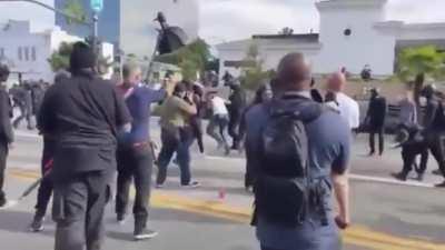 Trump supporter receives a mob beatdown at Beverly Hills protests