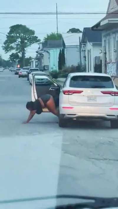 Lady blocks the street for a twerk video