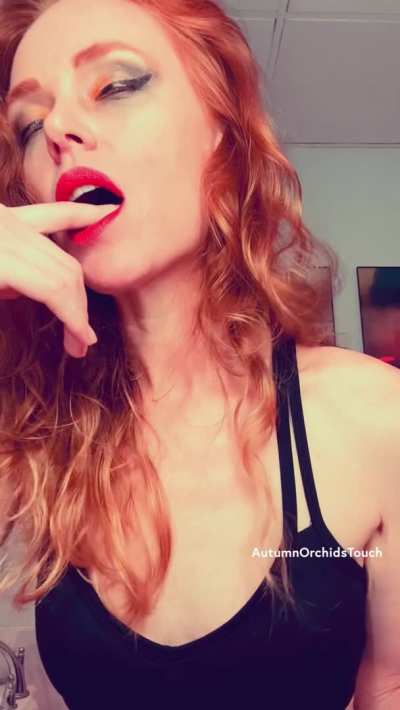 I move to the music, seducing you for a moment before I apply paint my lips red and fellate my fingers, smearing the lipstick down my face...