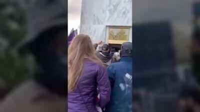 Police uses pepper-spray on Trump supporters trying to gain access to the Oregon State Capital building. The protestors are trying to find various doors and access routes leading into the building. The protest has been deemed unlawful.