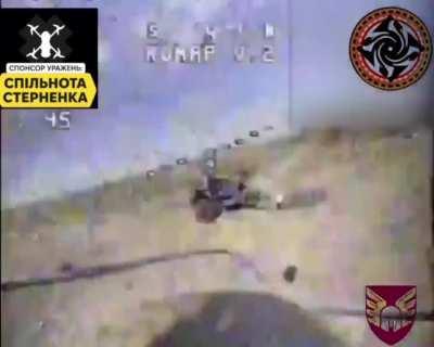 Ua pov While a Russian soldiers looks over a destroyed RF BTR-82a, a Ukrainian drone destroys his quad