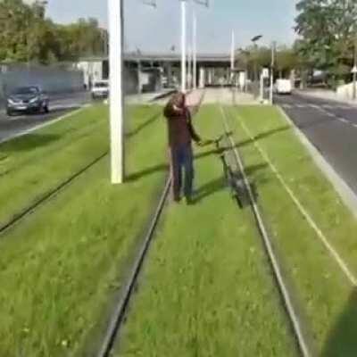 Man fighting a train
