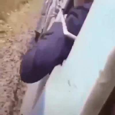 Man falls off and under moving train