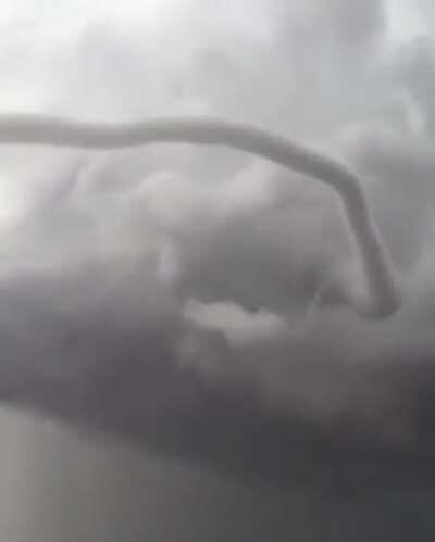 Guy realizes he's about experience a tornado first hand