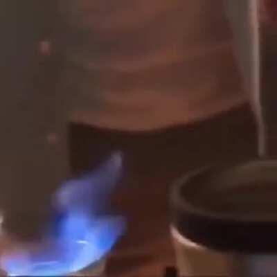 Man tries to drink flaming alchohol