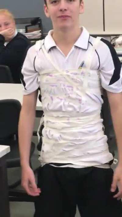 wrapped a friend in tape