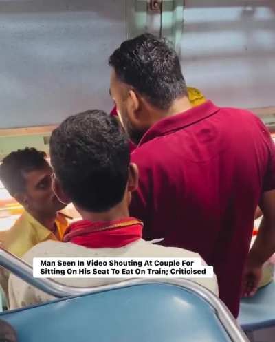 Man scolds a couple who occupied his seat and was eating food !!