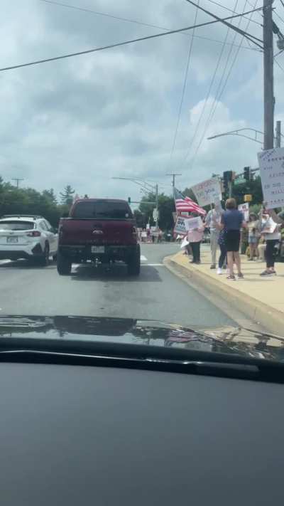 Truck Driver Rolls Coal on No-Kings protestors