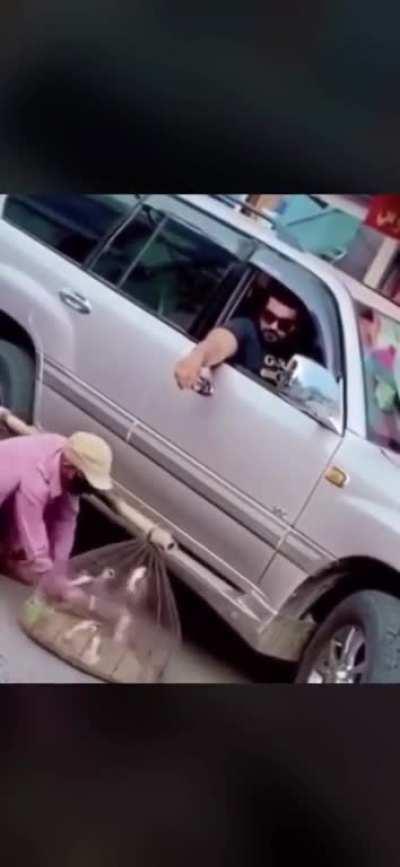 Catching birds mid-flight and giving them to the street merchant