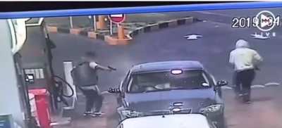 BMW owner getting gas gets blown down by his opps while in his car