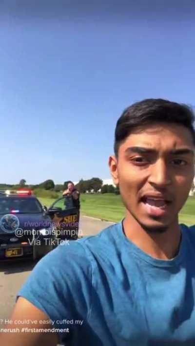 Driver refuses to stop recording himself being arrested at gunpoint