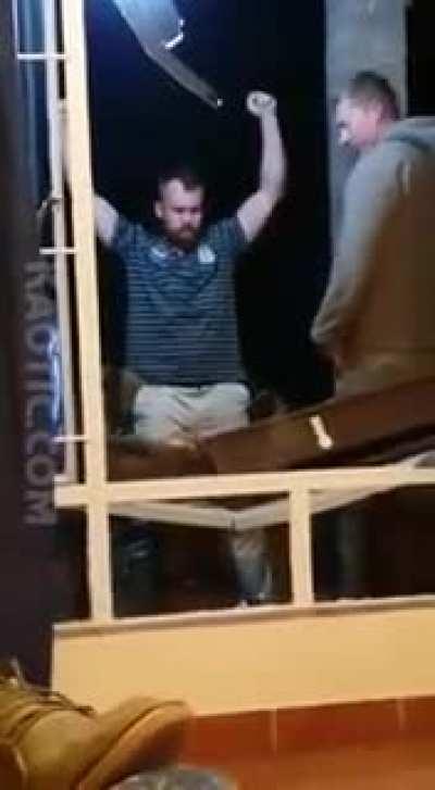 Man swan dives through plate glass window.