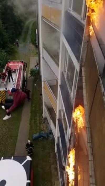 While in a burning building he/she is able to capture this shot