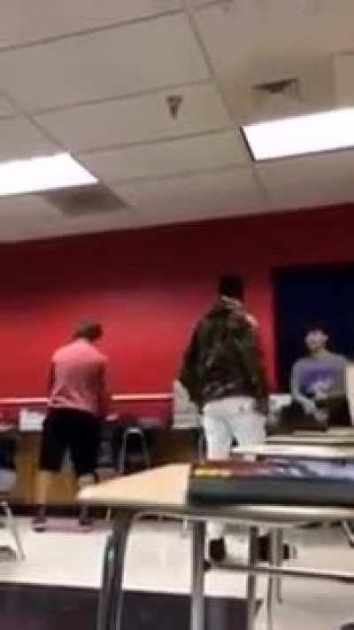 Spitting bully gets Karma from a bystander