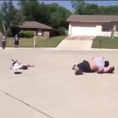 Huge wrestler takes on two guys at a time