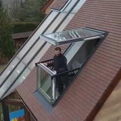 A roof window turning into a small balcony
