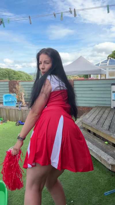 Farting outdoors while dressed as a cheerleader