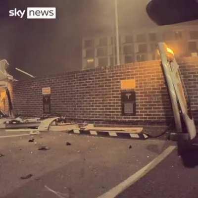 22 August 2022 (London) - A Range Rover crashes through barriers into a Tesla charging station