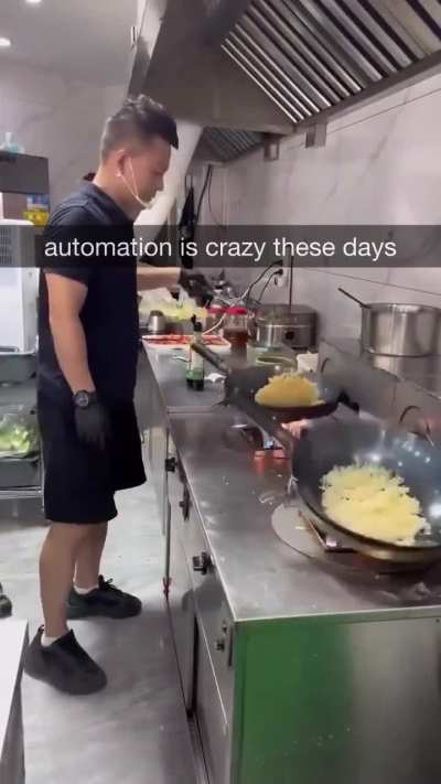 Automated wok tossing