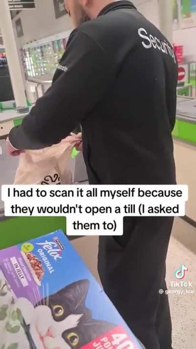 A security guard accuses a female customer of being drunk in ASDA (Dewsbury, West Yorkshire)