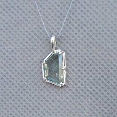 1.7ct, 10.5x6mm Unheated Montana Sapphire Tablet in a silver prong 360 pendant! An example of how we can set tablets now! $500