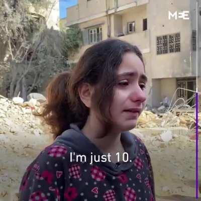 A 10 year old Palestinian girl breaks down while talking to a journalist after Israeli airstrikes destroyed her neighbor's house, killing eight children and two women.