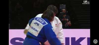 Japanese judoka carries her injured opponent on her back after wrestling 9+ minutes with her