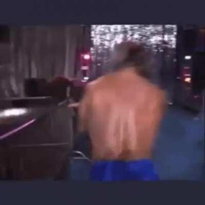 Mick Foley with a Graceful Flip on the Guard rail !!