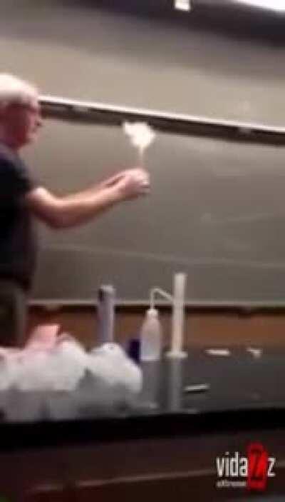 WCGW teacher doing an experiment with fire
