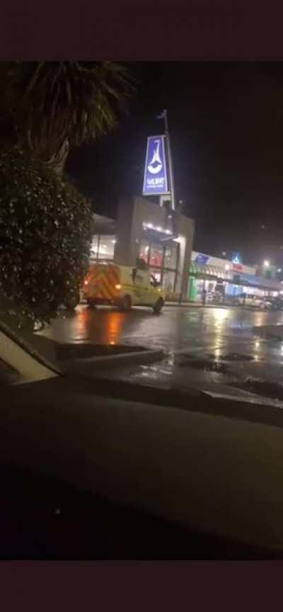 Guy escapes police van.