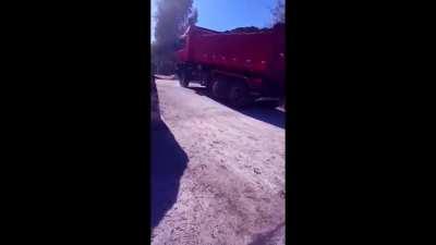 Truck emerging from the sea