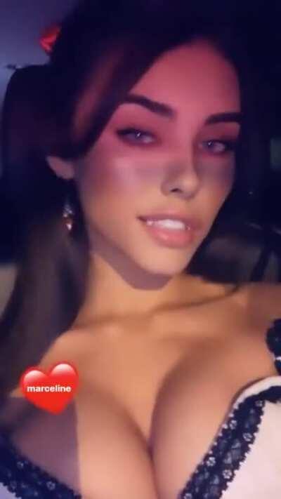 That push-up bra is doing wonders for her