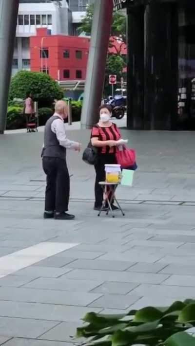 Old man busker robbed by young man in orchard road