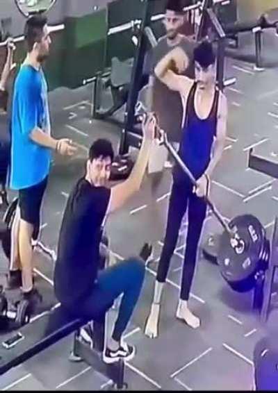 Giga Chad saves a man from getting his skull smashed by a lifting rod at the gym